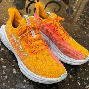 Hoka Vibrant Orange and Coral Sneakers